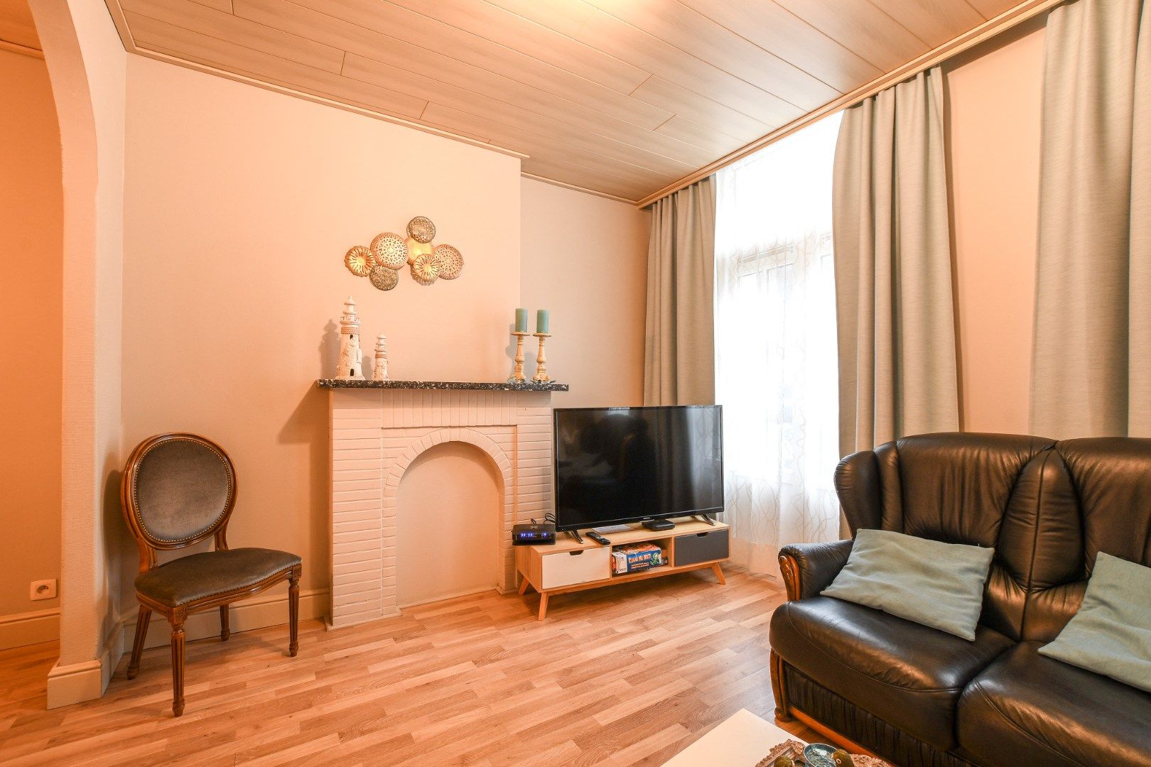 Opbrengsteigendom met 2 ruime appartementen en handelszaak op toplocatie! foto 24