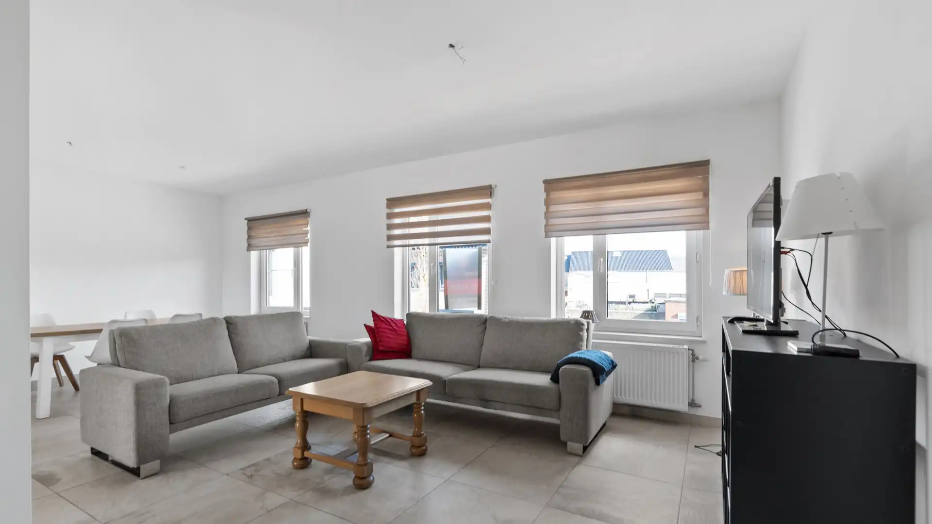 Wonen boven je zaak? Ontdek deze instapklare opportuniteit in het hart van Maasmechelen foto 16