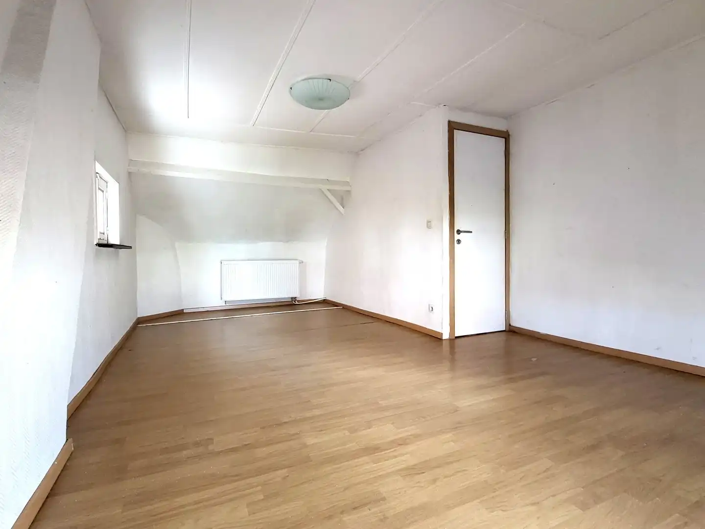 Halfopen bebouwing met 3 slaapkamers en zonnig tuintje in rustige dorpskern. foto 19