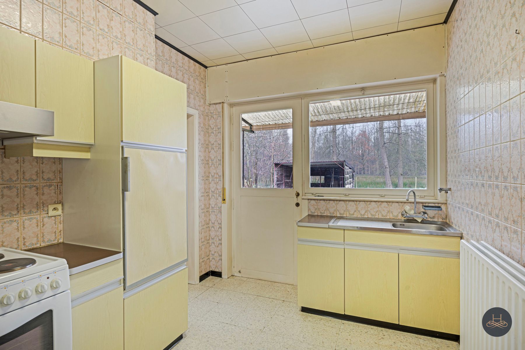 Te renoveren woning nabij centrum Wilsele-Putkapel foto 12