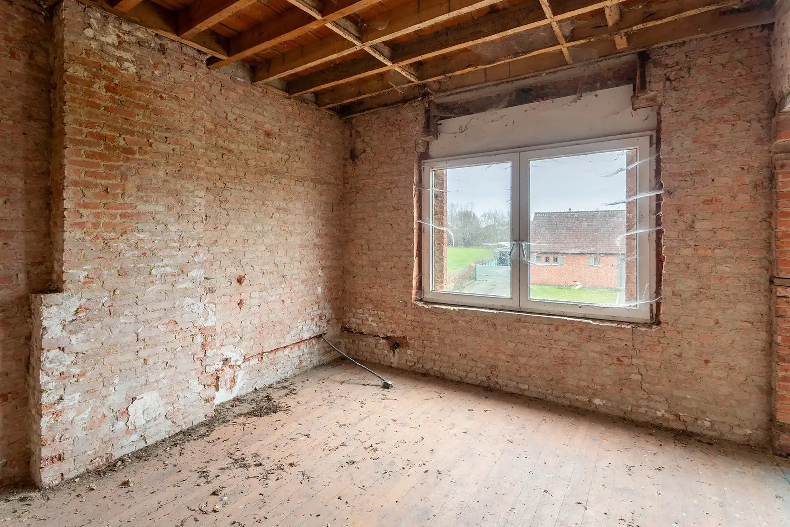 Te renoveren woning met enorm potentieel in het groene Kapelle-op-den-Bos foto 13