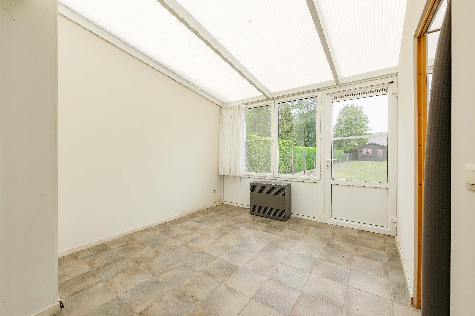 GOED ONDERHOUDEN RIJWONING MET 3 SLPKS, TUIN & GARAGE foto 5