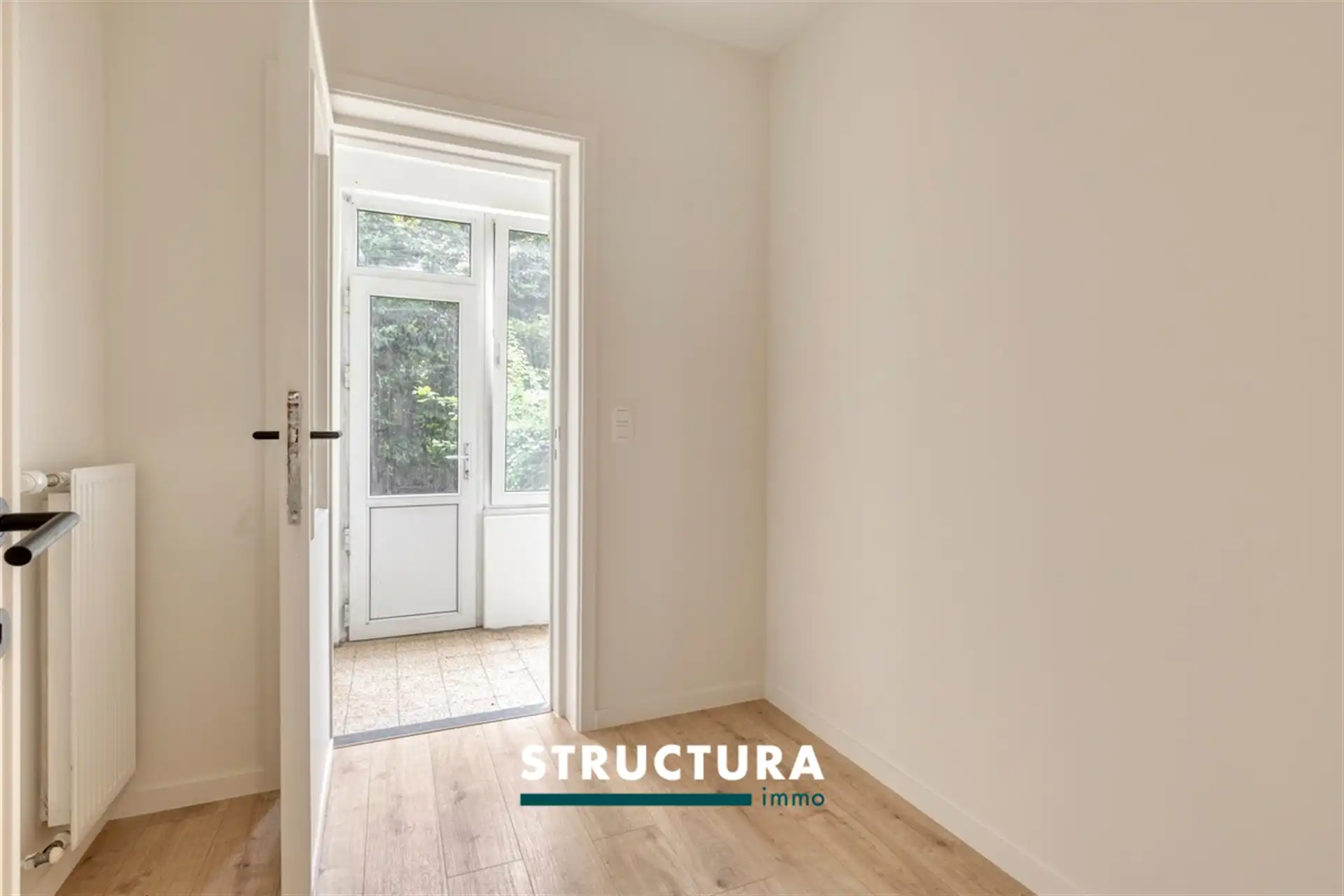 Gerenoveerd appartement met tuin op centrale ligging foto 11