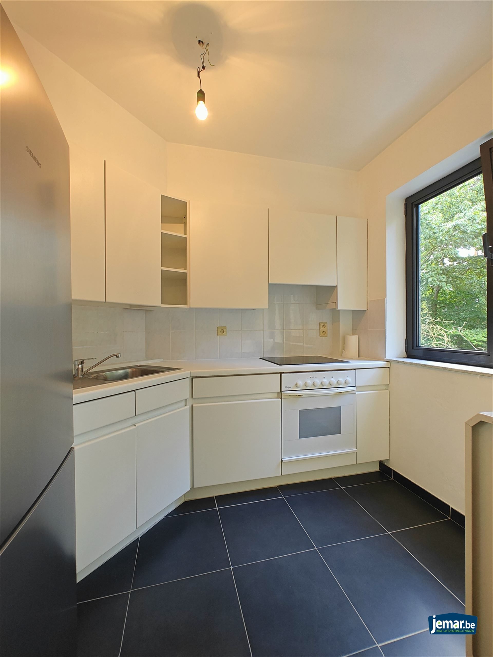 Instapklaar gerenoveerd appartement met 2 slaapkamers, ondergrondsparking en  berging  foto 7
