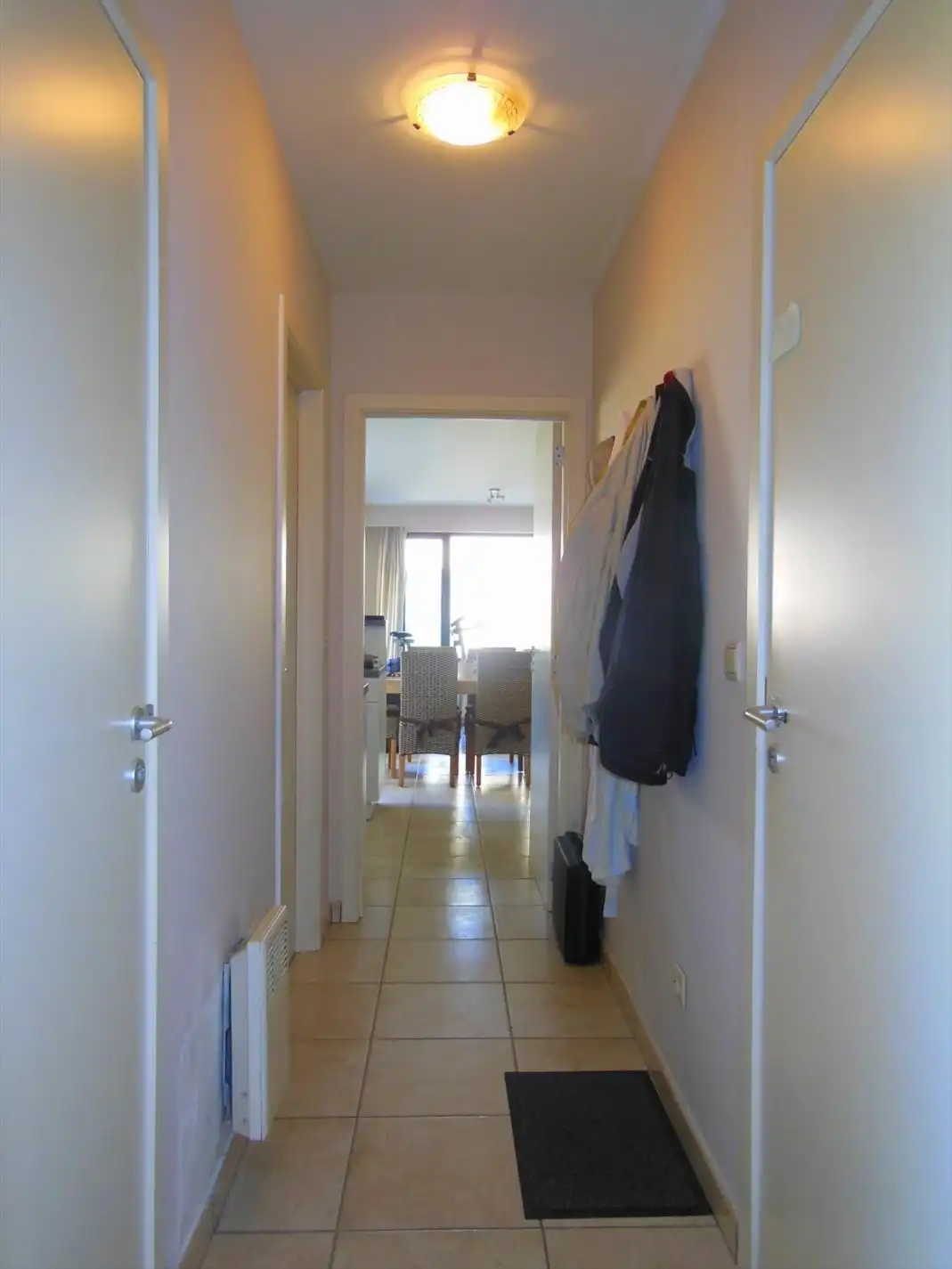 Gezellig gelijkvloersappartement met zonnige tuin en garage foto 9