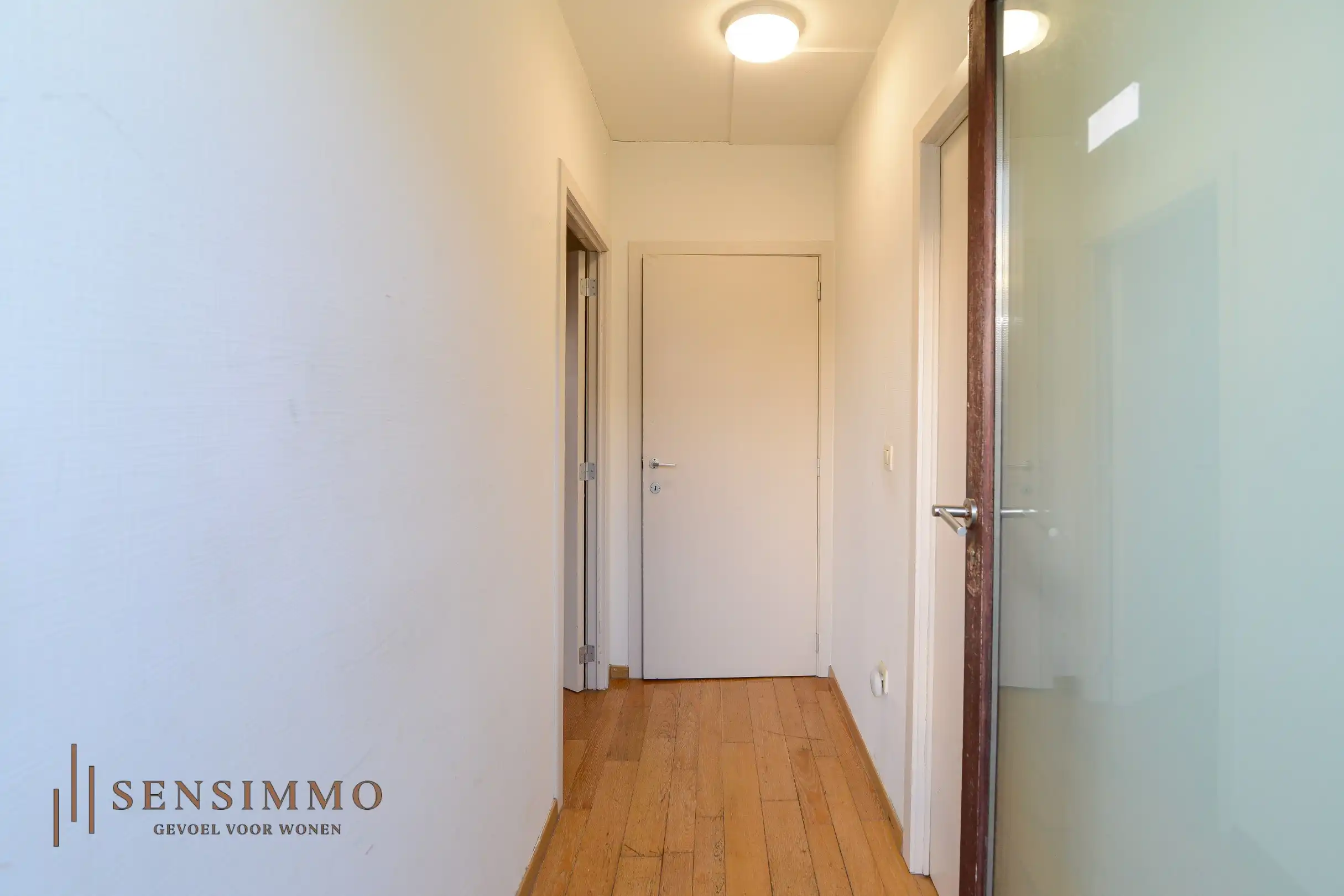 Eenslaapkamer appartement + terras, parking en kelderberging foto 8