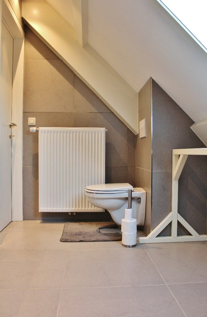 Recent vernieuwde woning met 4slpk, garage, zuidgerichte tuin & buitenberging foto 16