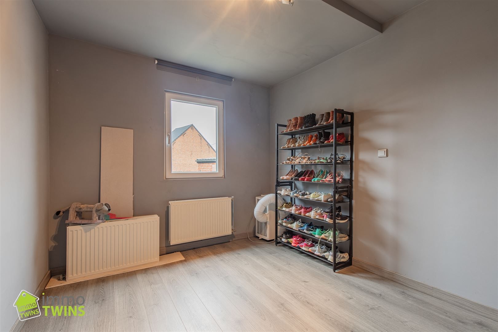 Ruime en lichtrijke gezinswoning met zonnige tuin en inpandige garage in Lebbeke foto 18