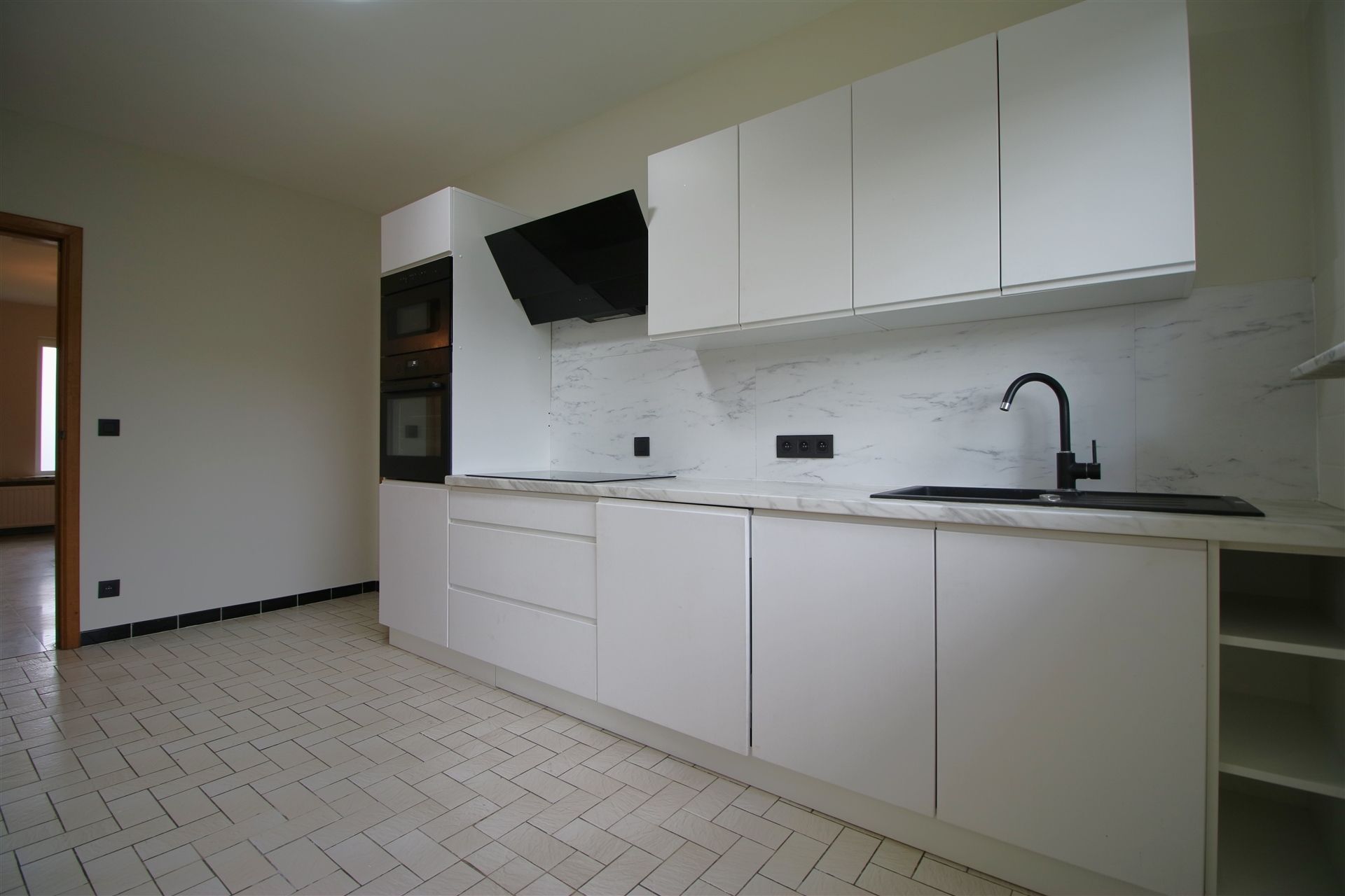 Ruime woning 4 slpk, garage en tuin foto 8