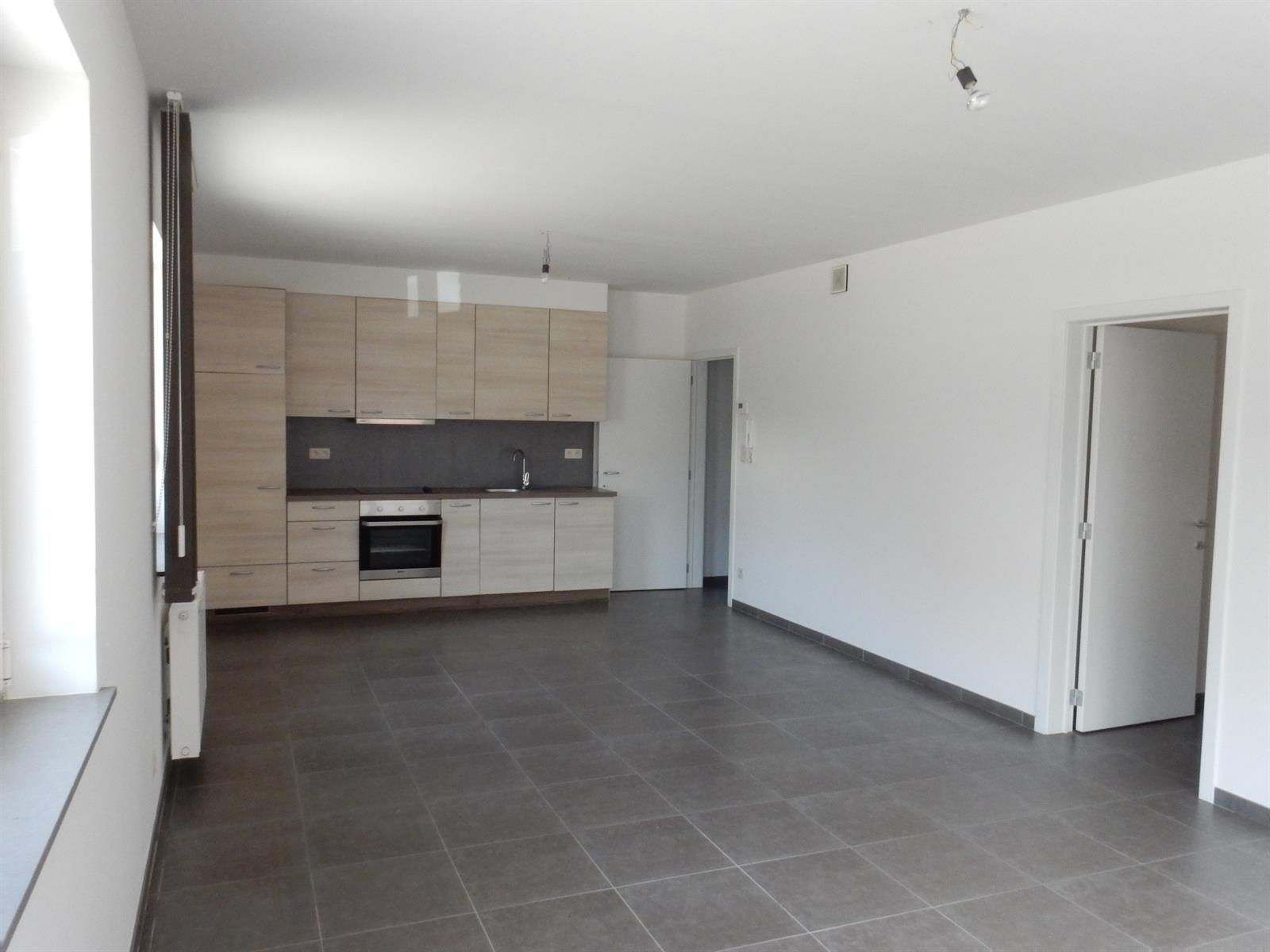 Appartement op het gelijkvloers van een kleinschalig appartementsgebouw. foto 2
