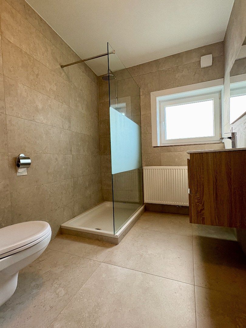 Compleet gerenoveerde woning met tuin en 4 slaapkamers in Tielt. foto 2