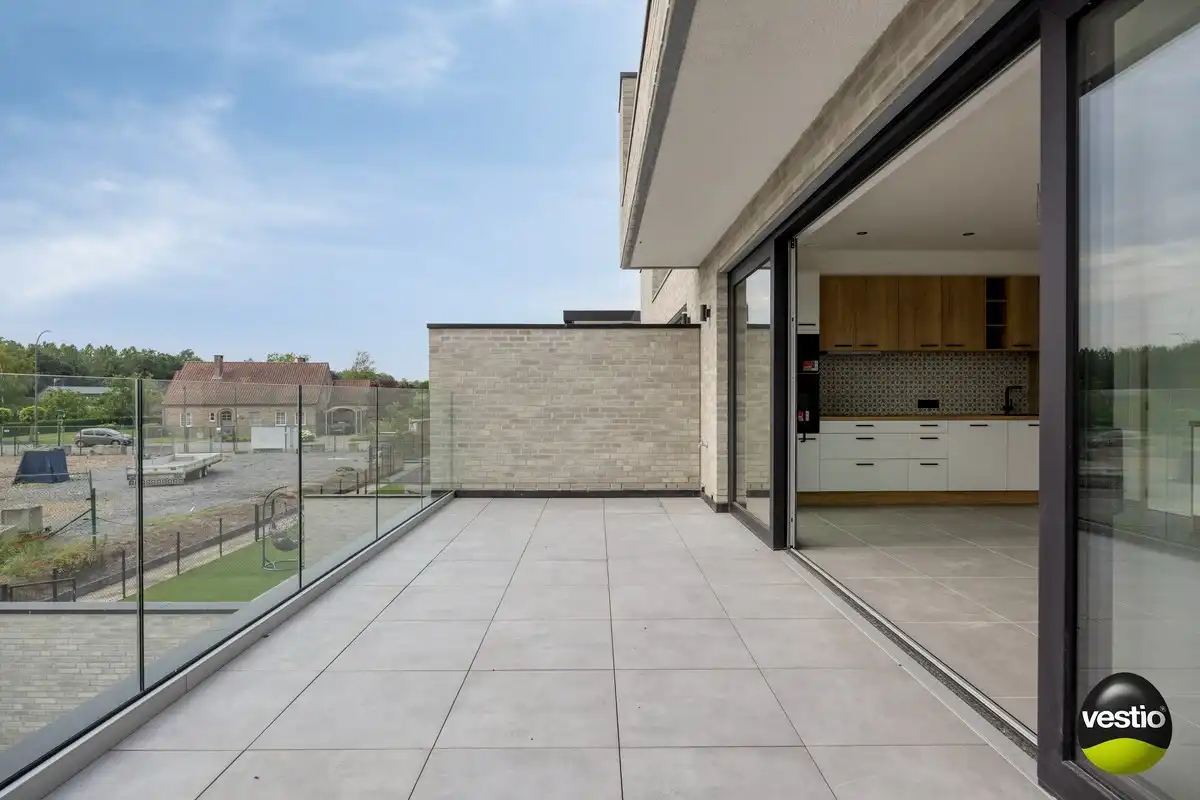 Nieuwbouwappartement met 2 slaapkamers en ruim terras in Munsterbilzen – slechts 2% registratierechten! foto 11