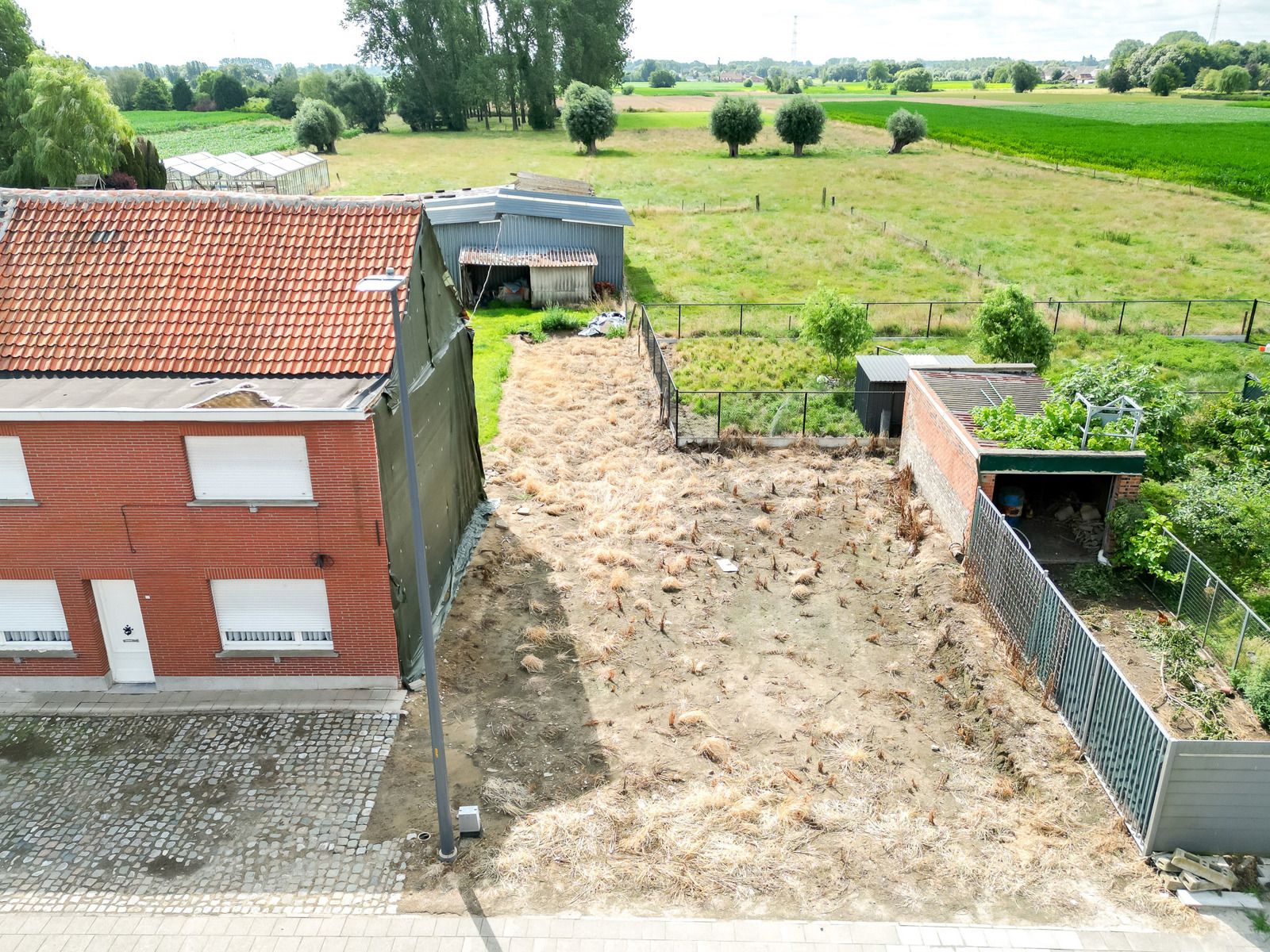 Bouwgrond voor halfopen bebouwing (258m²) te Tisselt foto 2