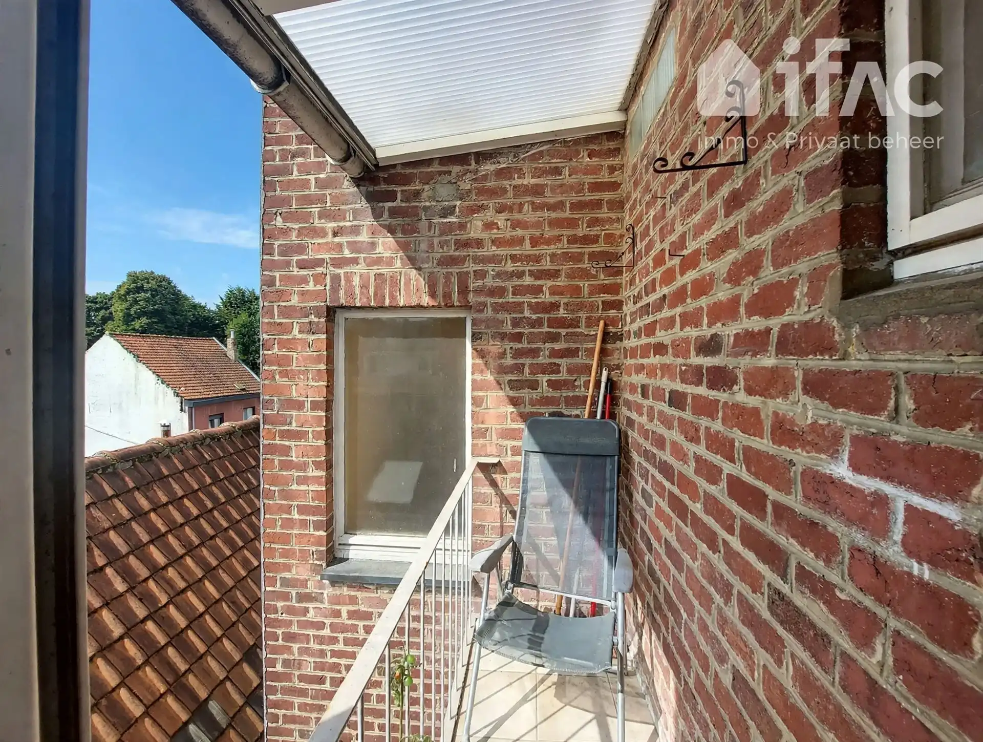 Lichtrijk appartement 3de verdiep met lift in het centrum foto 5