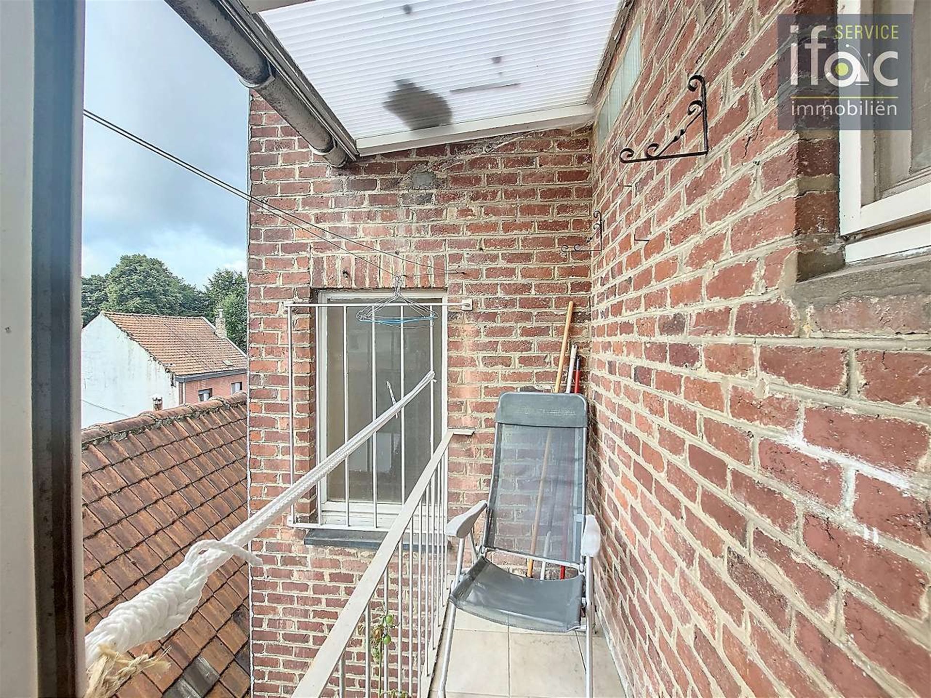 Lichtrijk gerenoveerd 2-slaapkamerappartement met lift in Te foto 5