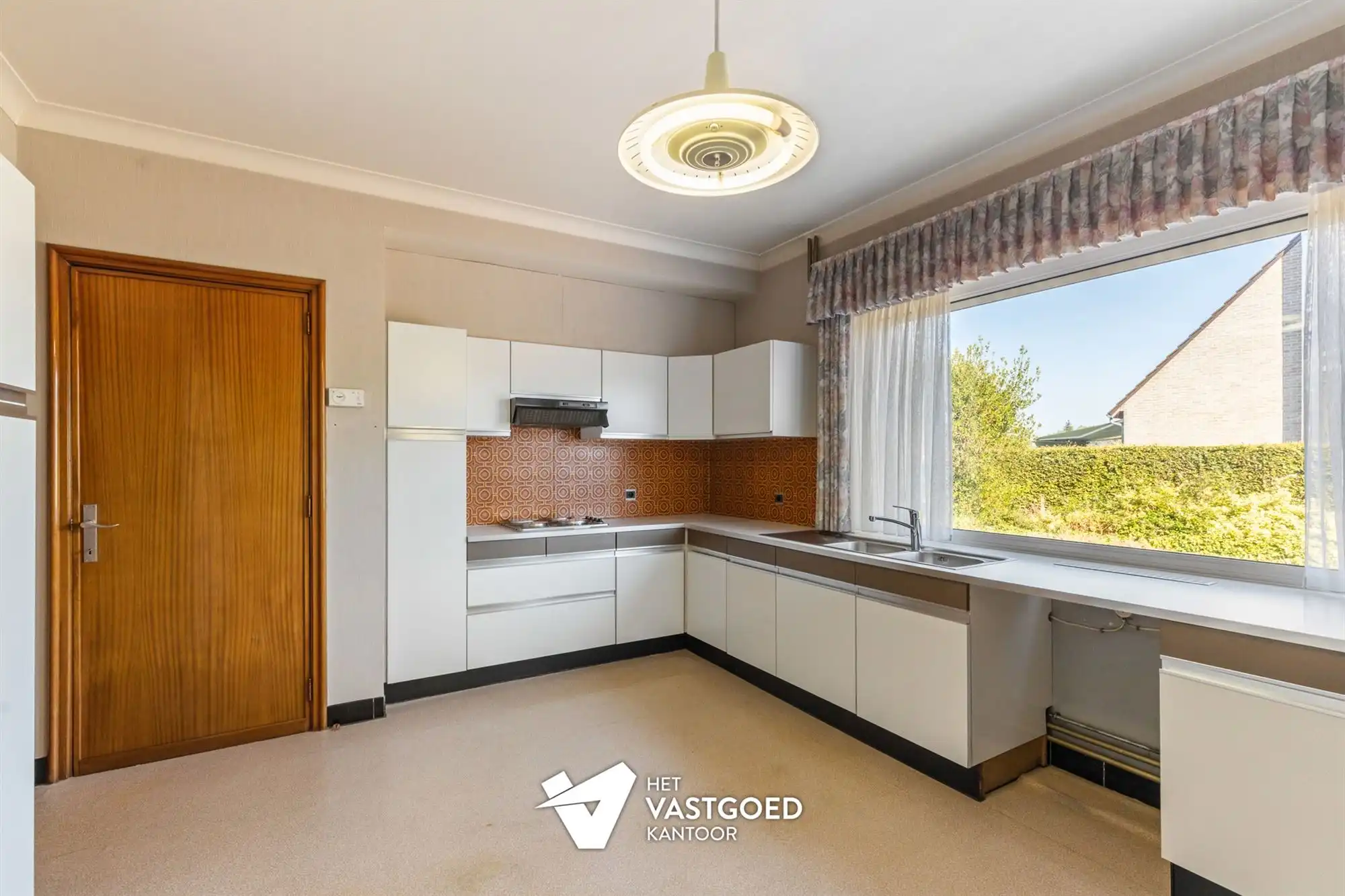 WONING MET POTENTIEEL (155M²) MET 3 SLAAPKAMERS EN GARAGE OP EEN PERCEEL VAN 12 ARE TE TESSENDERLO foto 7