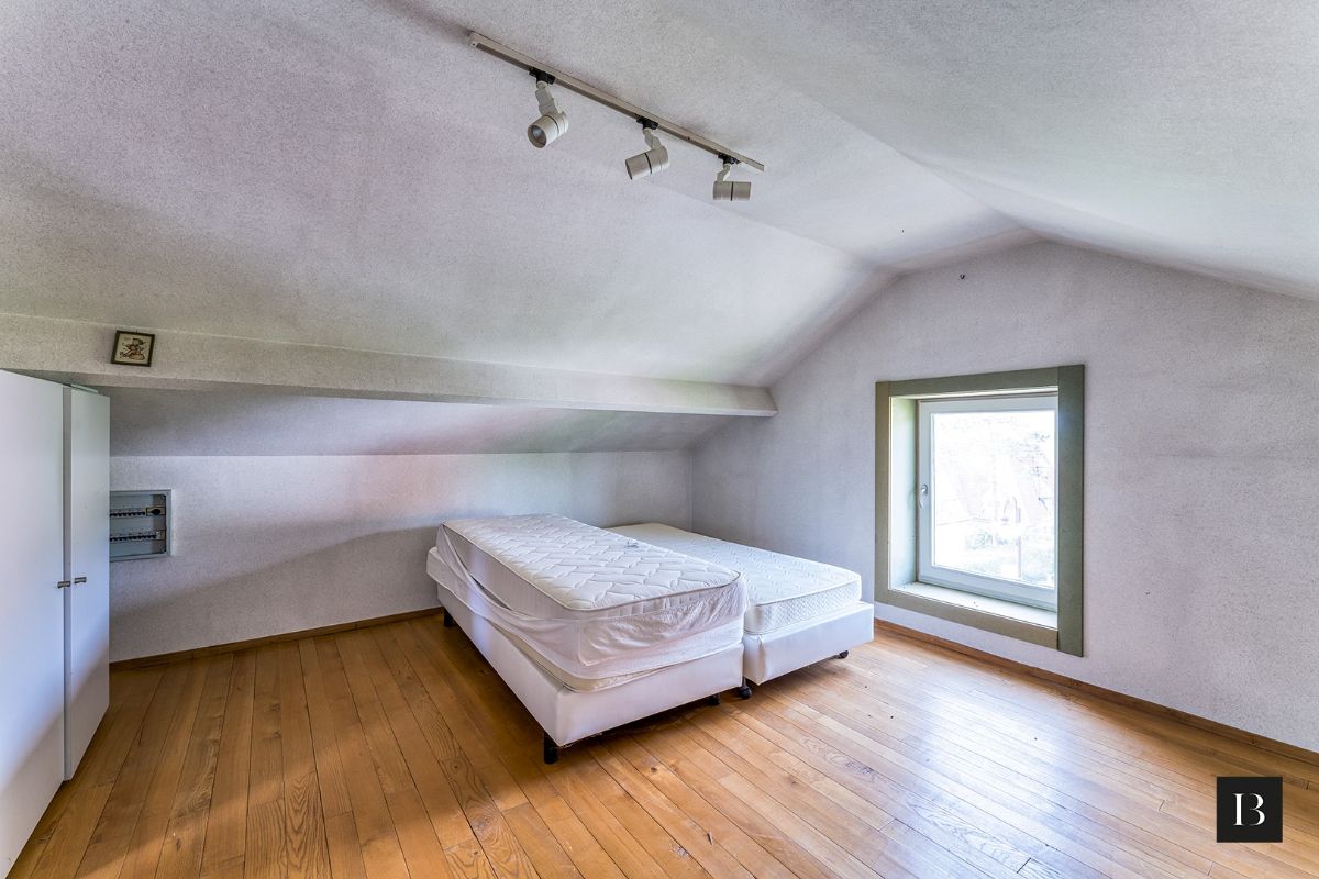Ruim (123m²) appartement met garagebox en zolder in de Concessie foto 14
