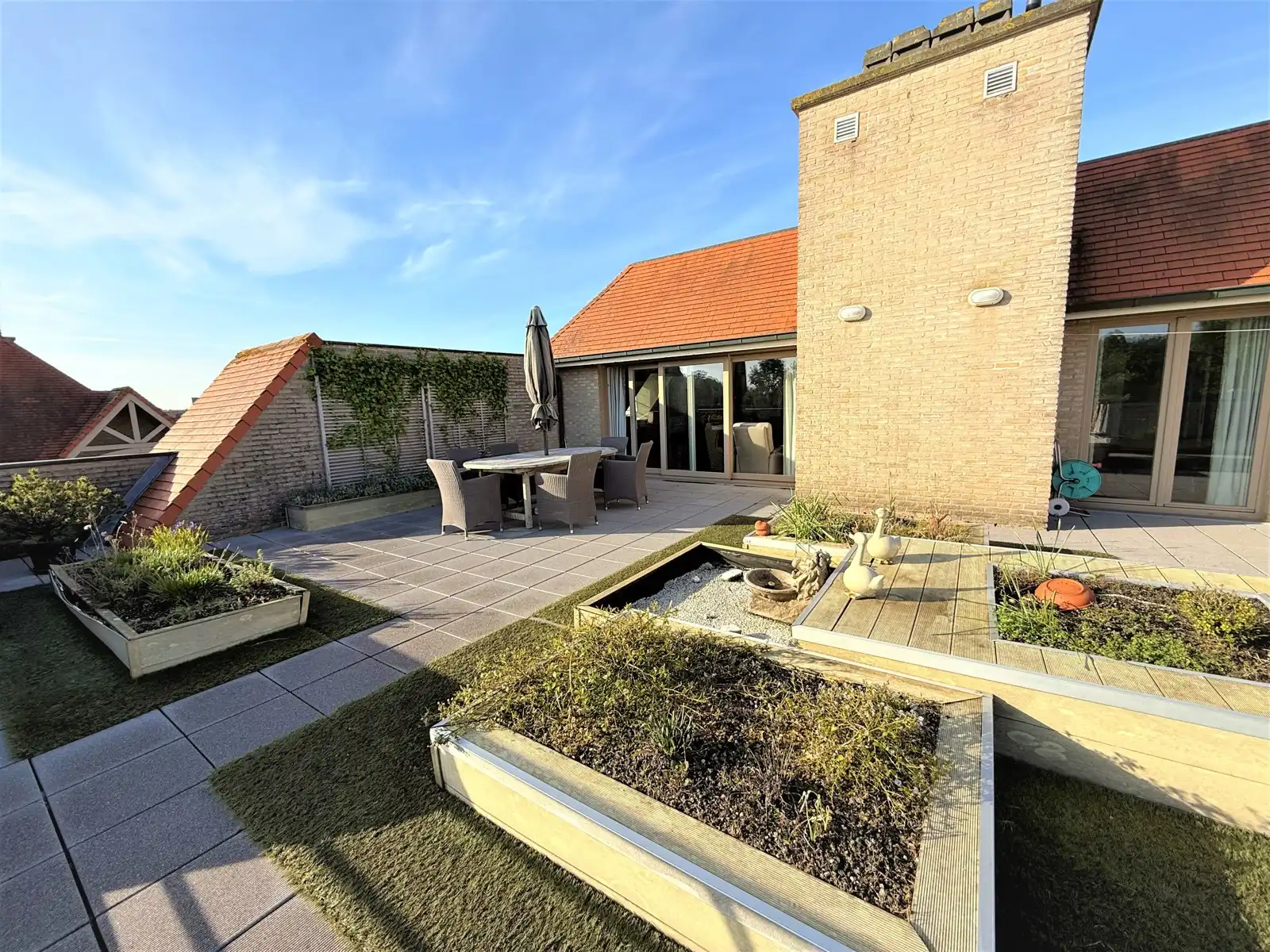 Dakappartement met 3 slaapkamers en enorm terras foto {{pictureIndex}}
