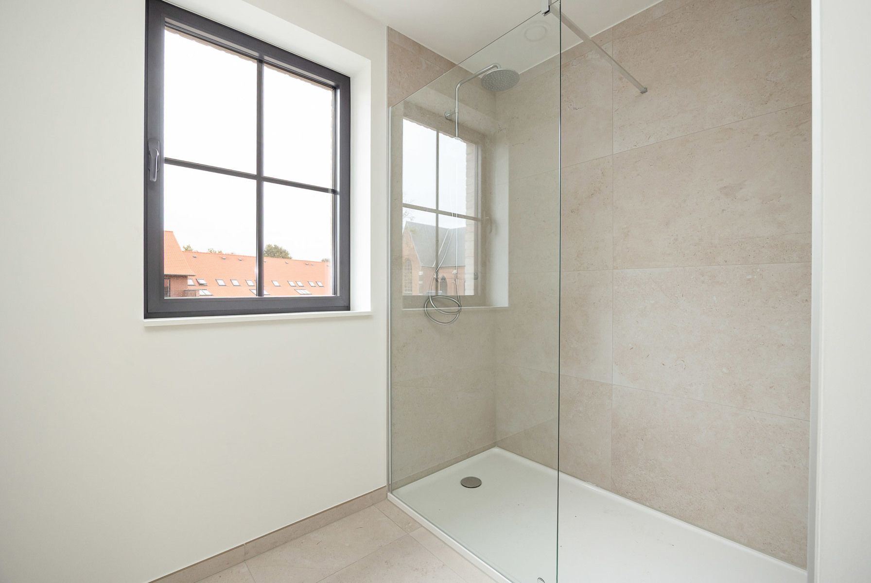Stijlvol wonen in de schaduw van de St-Michielskerk. foto 9