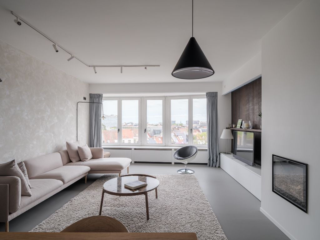 Omgeving Sint-Pietersstation. Stijlvol en architecturaal gerenoveerd appartement met 2 volwaardige slaapkamers, privatieve staanplaats en een zonnig terras. foto 2