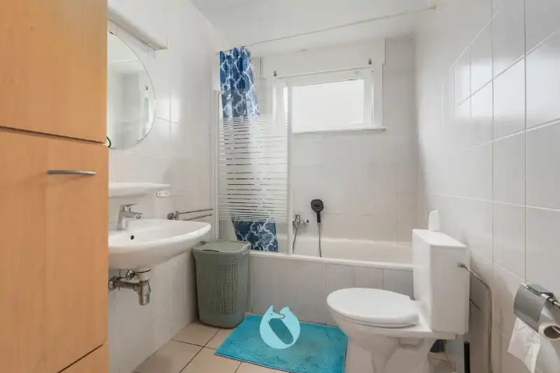 Kleinschalig gebouw met 2 appartementen en 2 garages foto 10