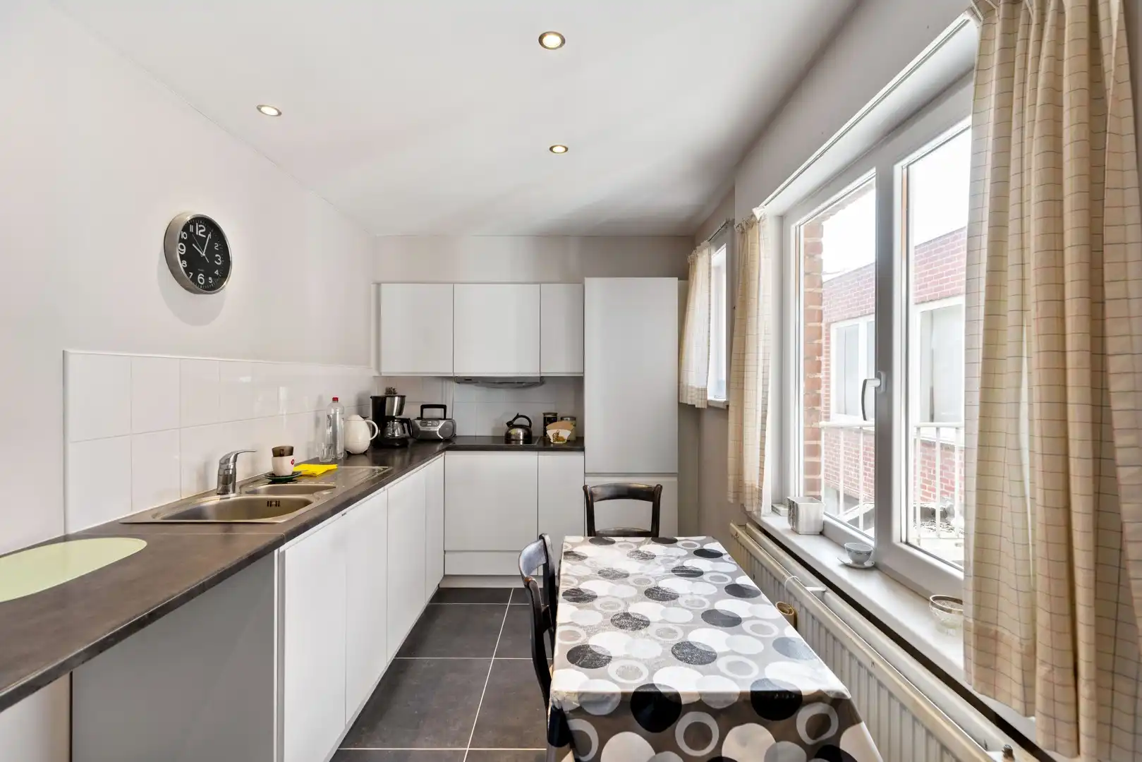Uitstekend onderhouden opbrengsteigendom met 7 instapklare appartementen en 2 garages in het centrum van Izegem foto 23
