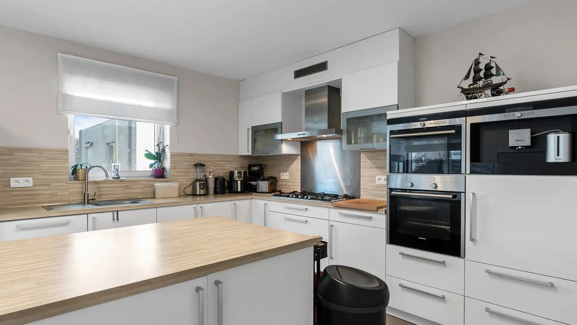 Trendy gezinswoning met open leefruimte, 4 slaapkamers en vrijstaande garage foto 11