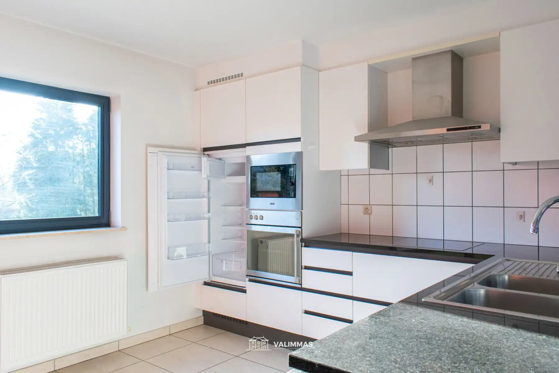 Ruim duplex-appartement met terras, grote kelder en zolder foto 5