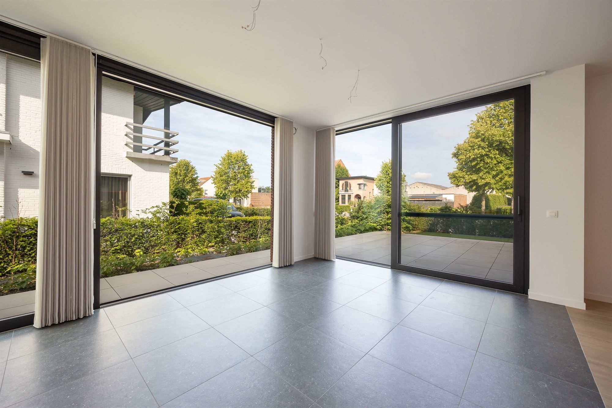 Lichtrijk en luxueus appartement met omvattende tuin foto 14