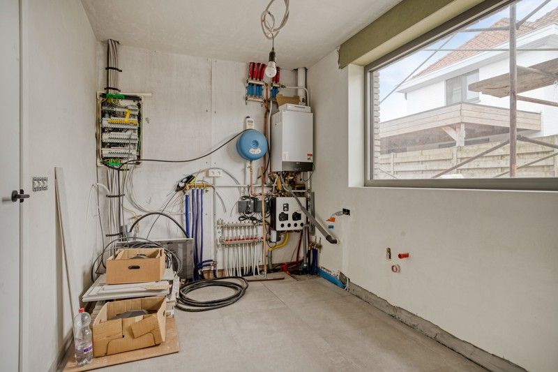 Moderne nieuwbouwwoning TE KOOP in een rustige buurt in WAREGEM! foto 14