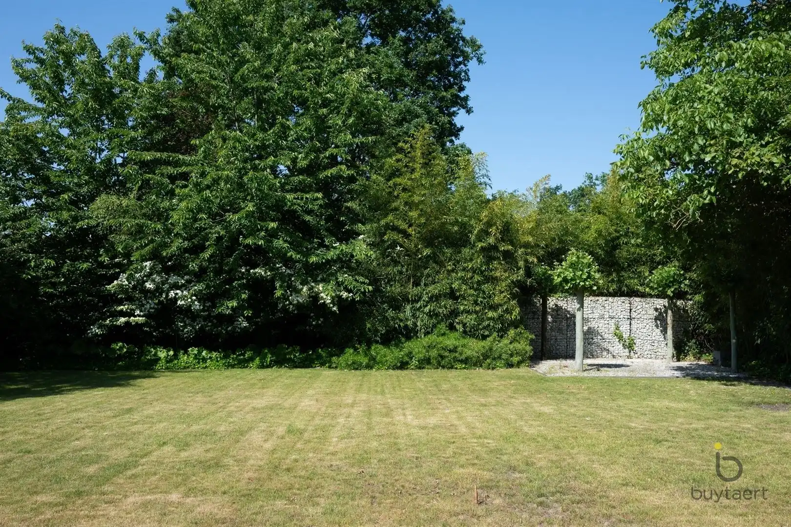 Te renoveren zonovergoten gelijkvloers 70’s woning met prachtige tuin en tal van mogelijkheden! foto 49