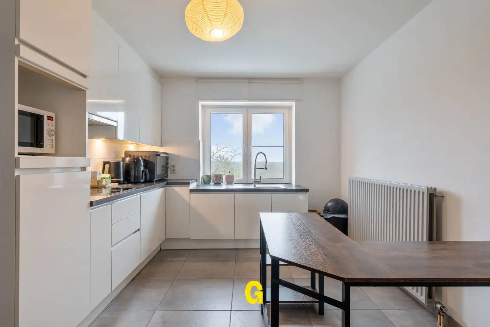 Netjes gerenoveerd twee slaapkamer appartement met terras en 2 standplaatsen in een kleinschalige residentie te Rijkhoven foto 5