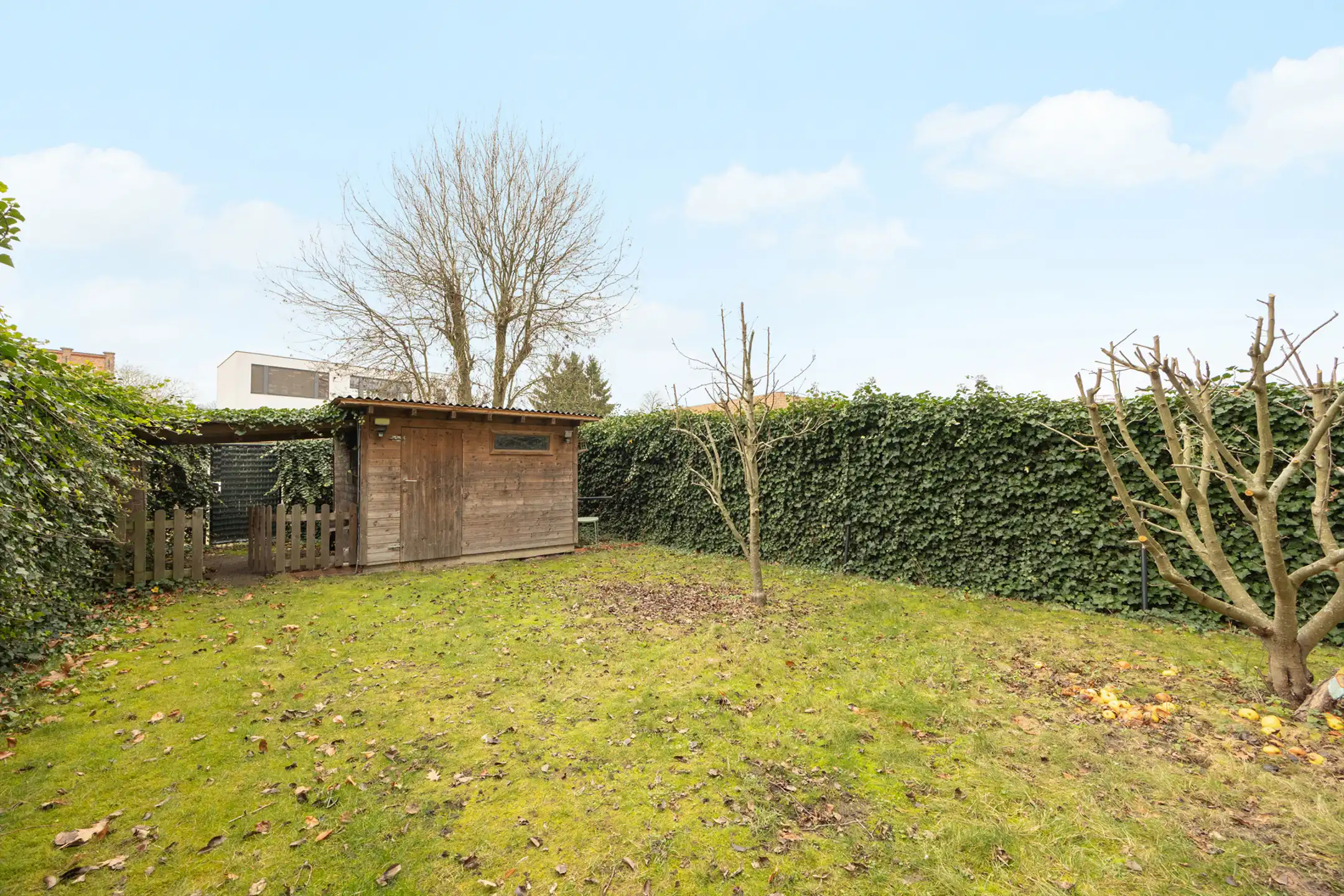 Gelijkvloers appartement met 2slkp en grote tuin foto 11