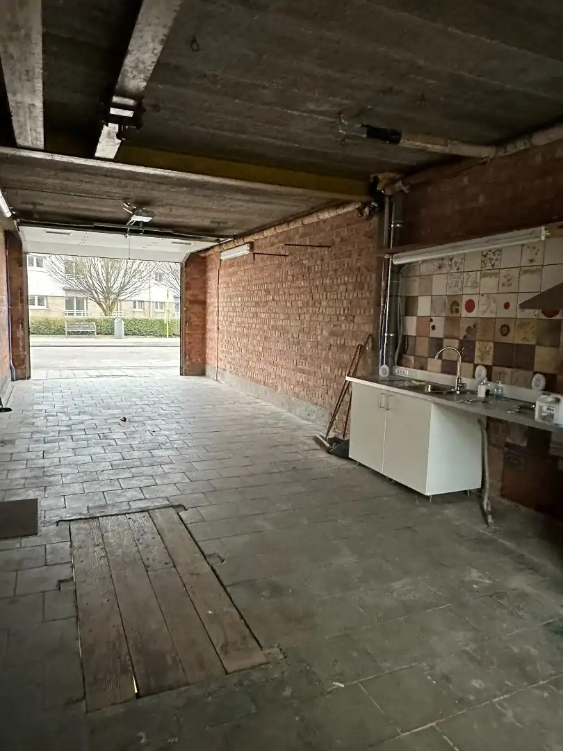 Gelijkvloersppartement met 3 slpk, dubbele garage, tuin en ruime kelder (120 m²) foto 16