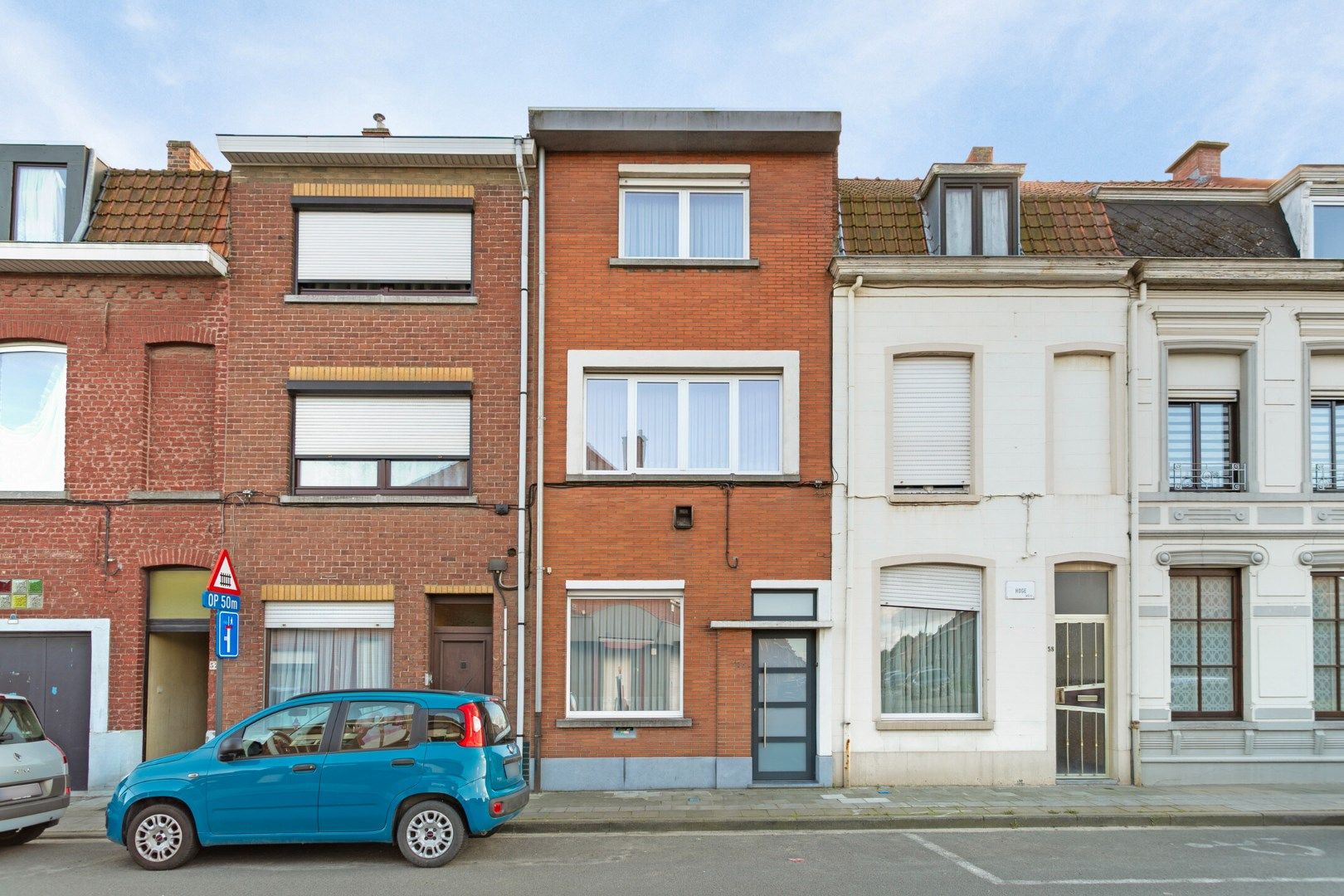 Zeer degelijk gerenoveerde woning met tuin! foto 2