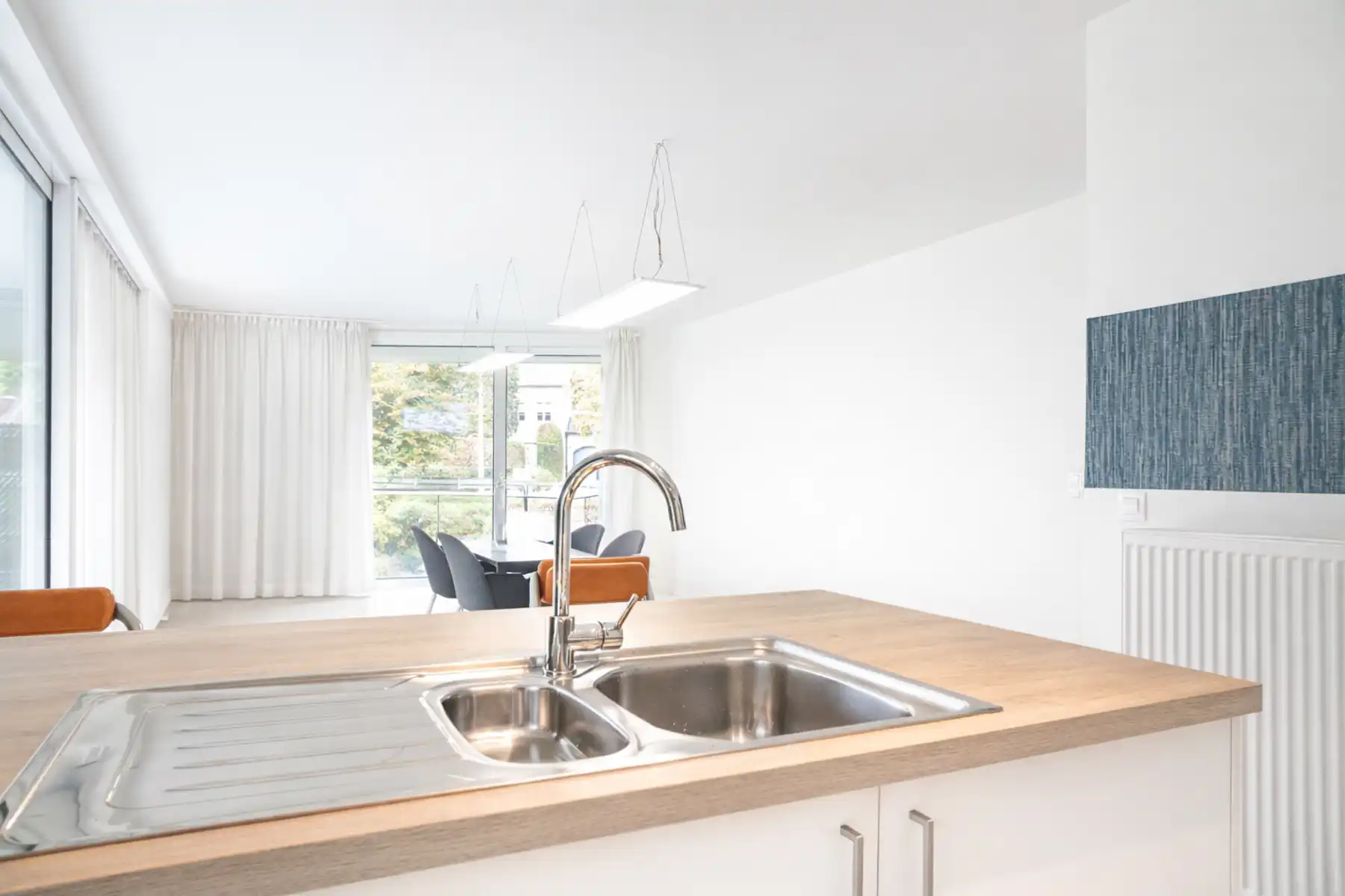 Lichtrijk gelijkvloers appartement met terras en tuinzicht foto 12