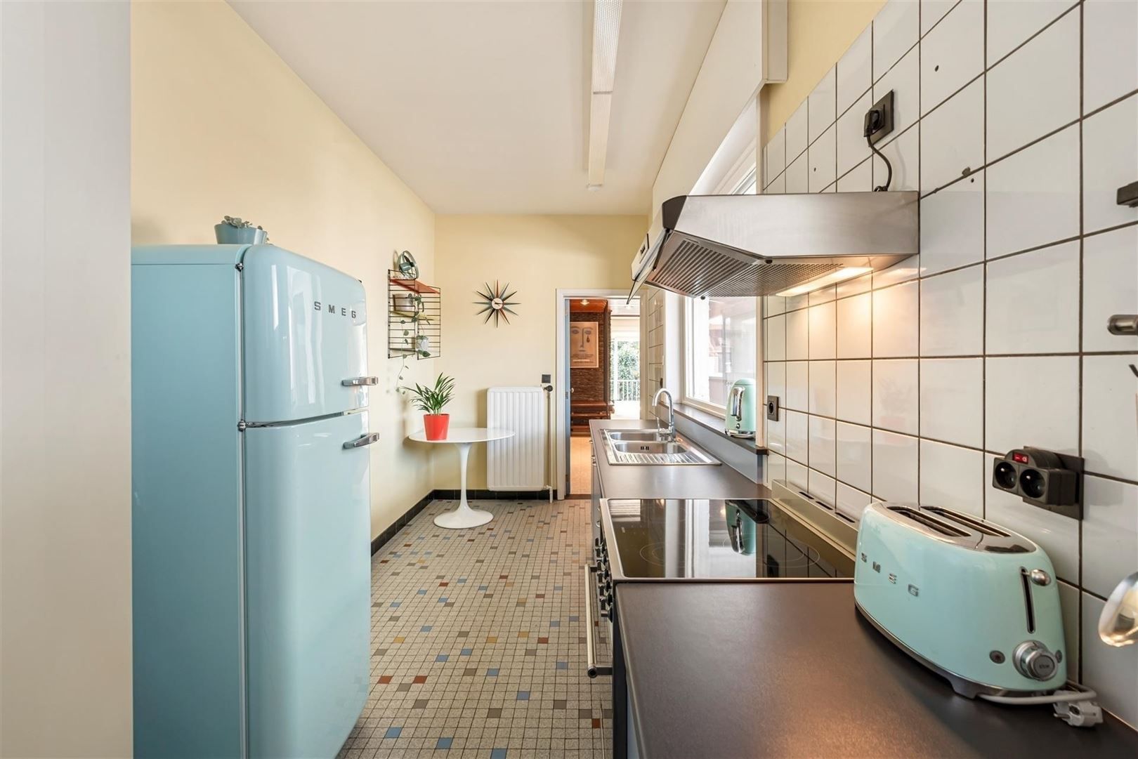 Ruime sixties woning, vrij van renovatieverplichting, gelegen in het centrum van de stad! foto 4