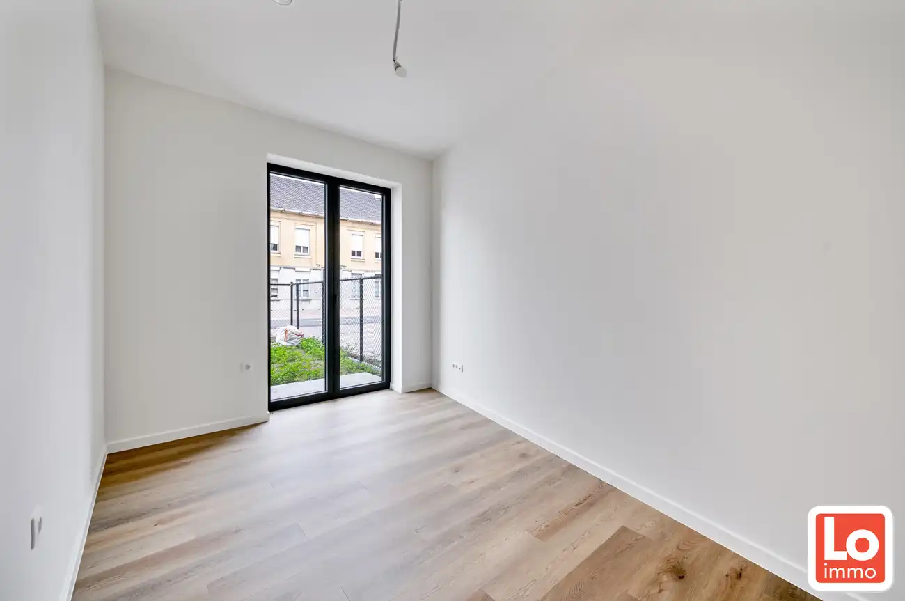 Prachtig ruim appartement (+/-96m²) met 2 slpk en mooi terras en afgesloten tuin foto 7