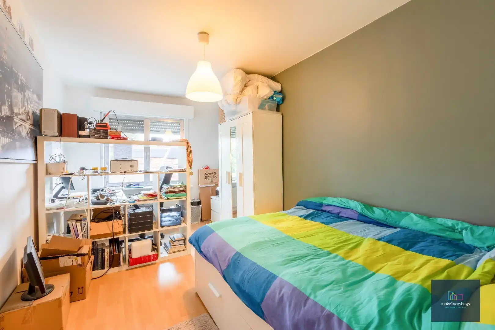 Heel ruime Instapklare woning in rij  met zonneterras en 2 staanplaatsen foto 19