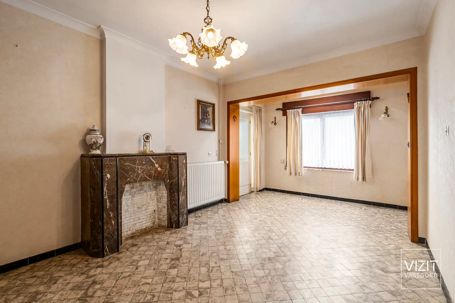Halfopen woning met tuin en garage foto 10