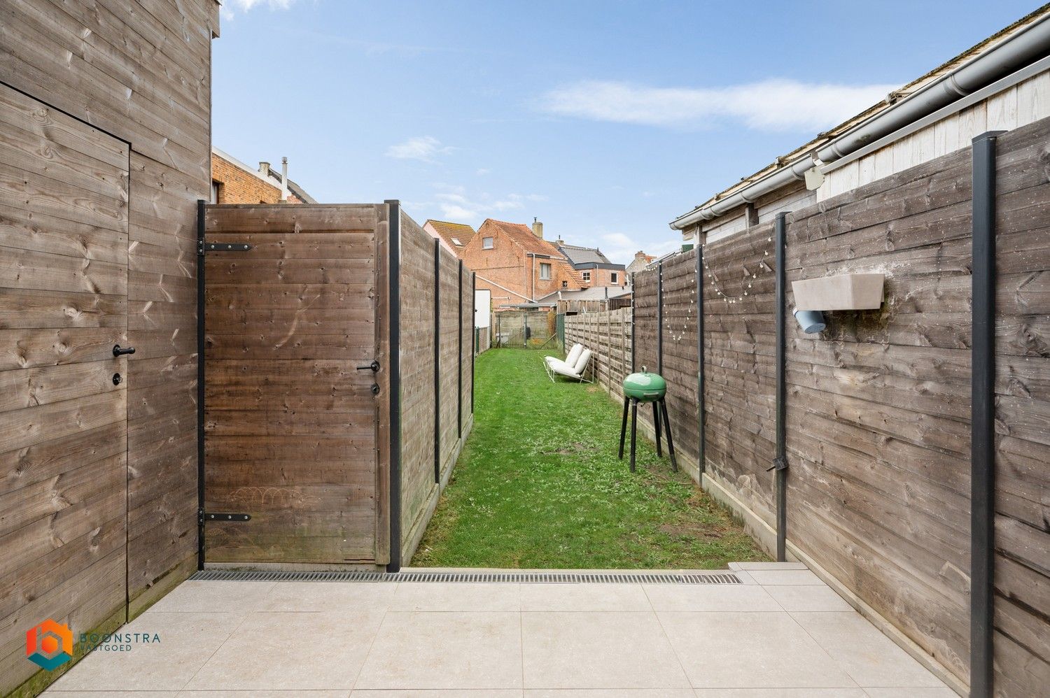 Rijwoning met  2 slpkrs en tuin foto 16