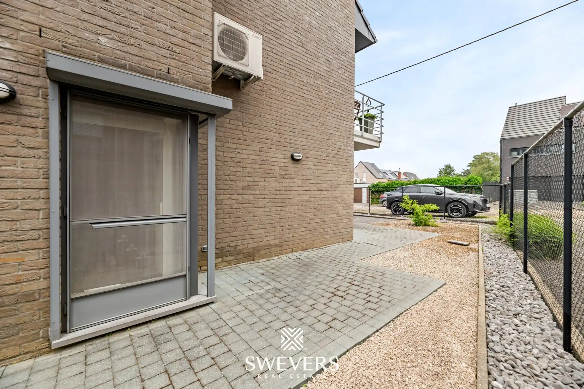 Ruim gelijkvloers appartement met tuin en ondergrondse autostaanplaats foto 28