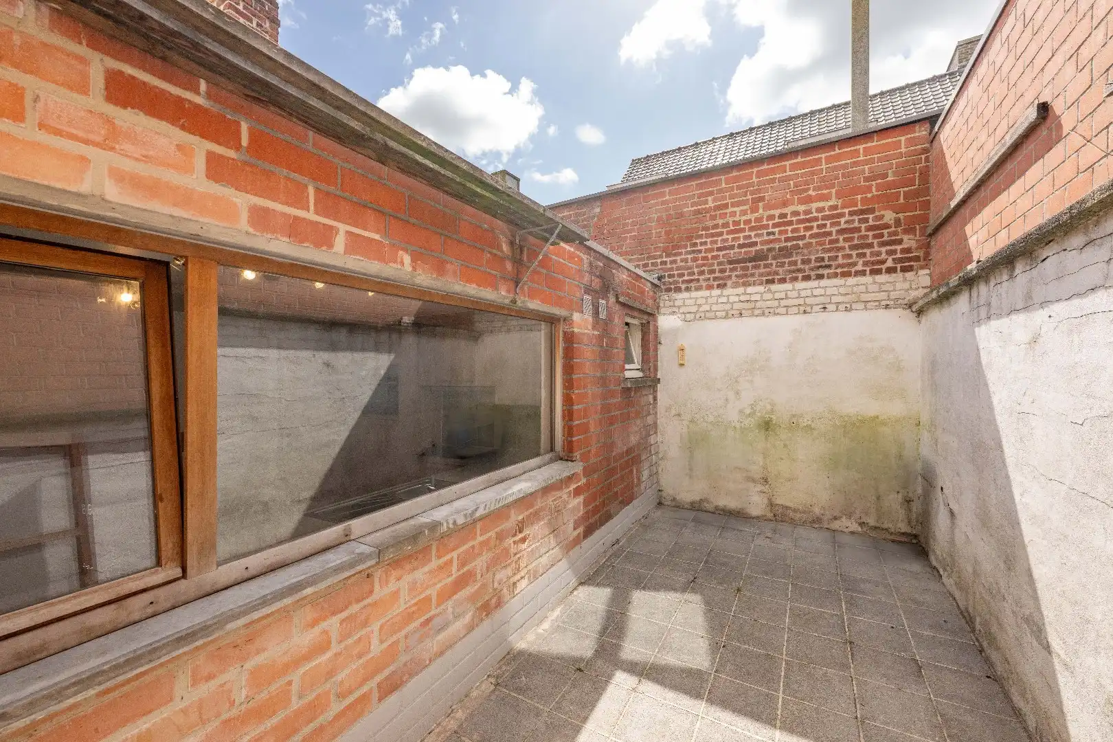 Te renoveren woning met tal van potentieel in centrum Aarsele foto 14