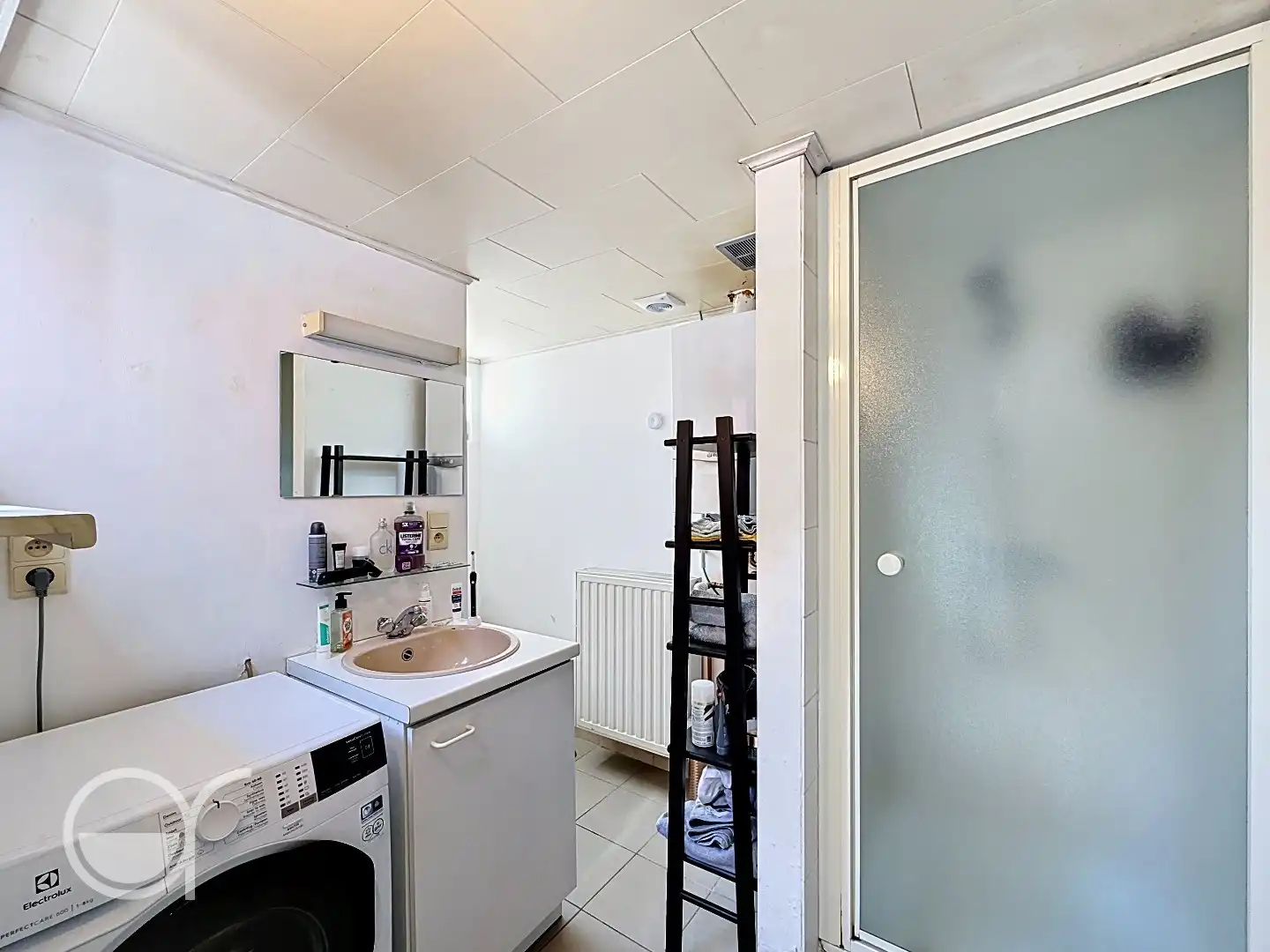 Rijwoning met 2 slaapkamers en zonnig stadstuintje in centrum Drongen foto 6