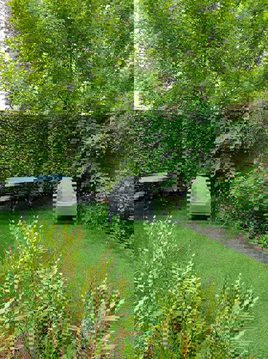 Karaktervol herenhuis met gezellige tuin en garagebox foto 28