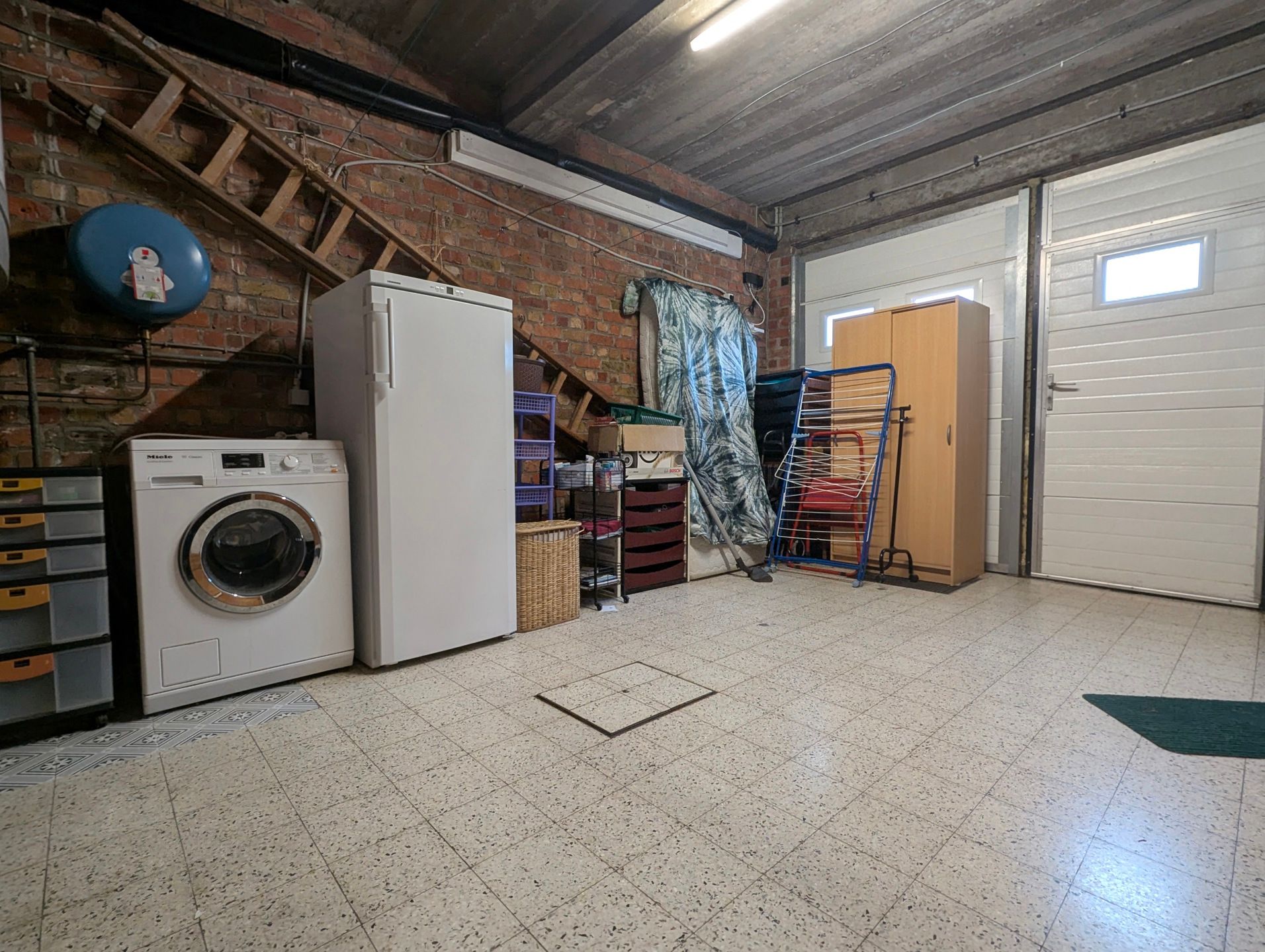 Ruime woning met zongerichte tuin te koop. Centrum De Panne aan zee. foto 4