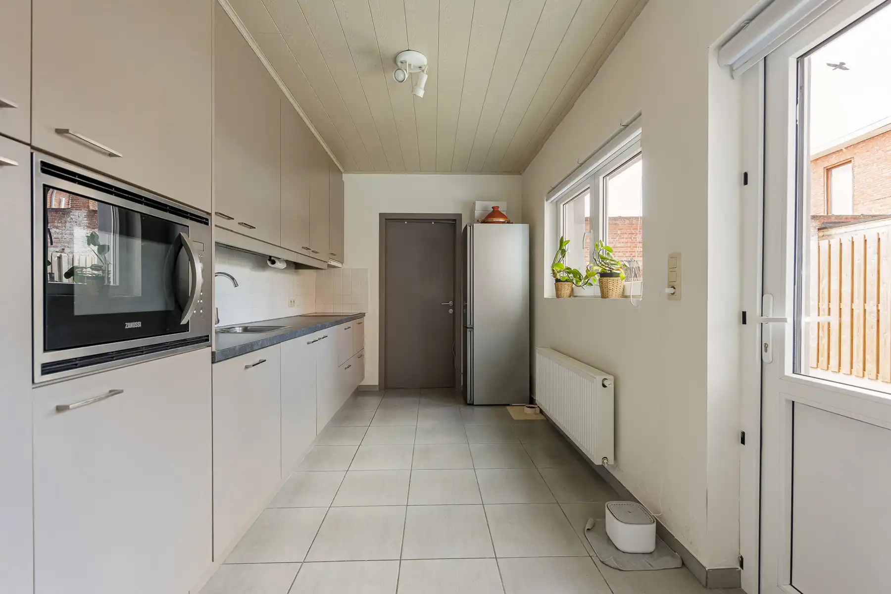 Gezinswoning met 3 slaapkamers en stadskoer met toegangspoort, gelegen binnen de ring van Turnhout. foto 6