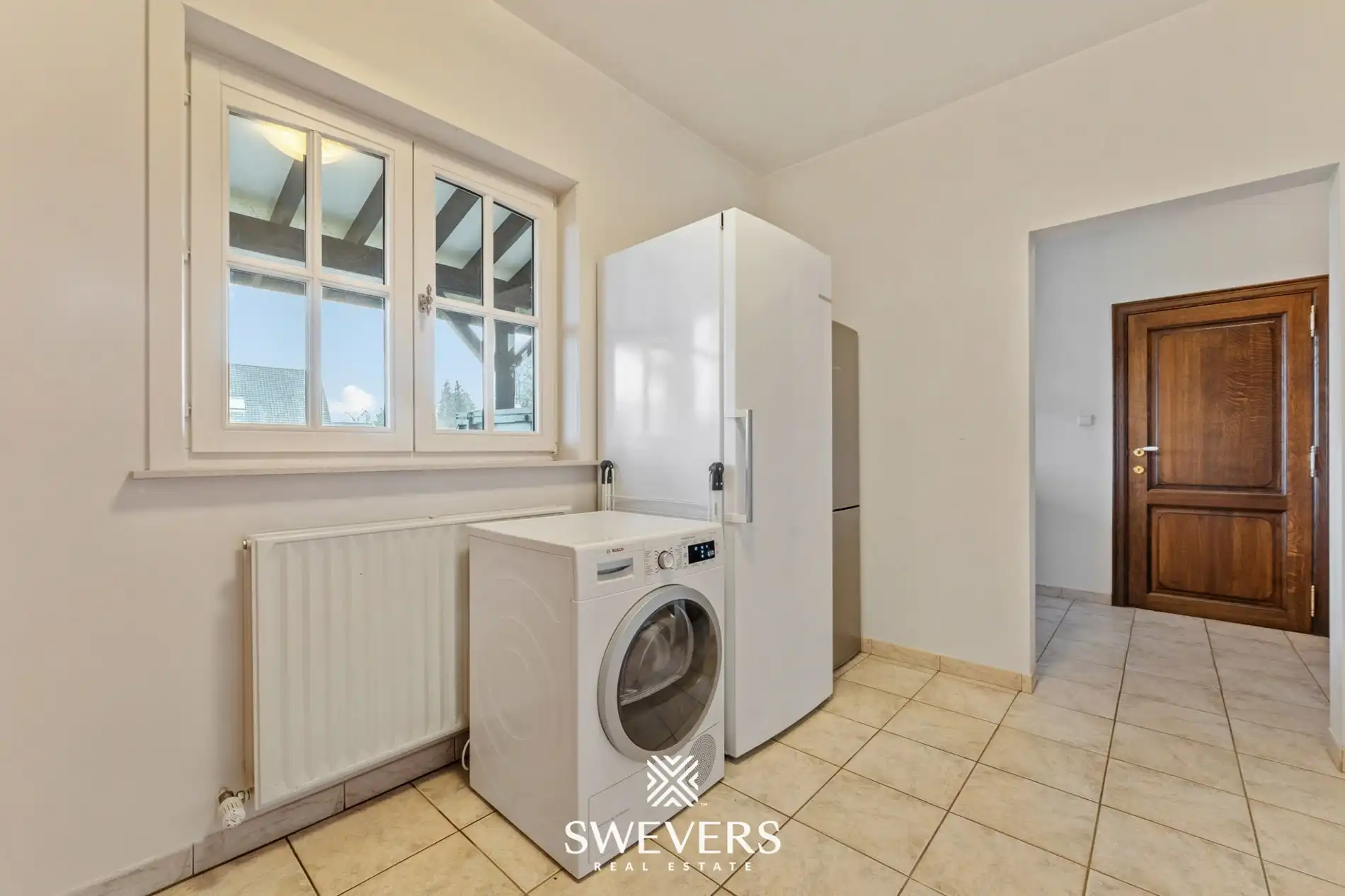 Ruime open bebouwing met 4 slaapkamers en zonnige tuin in Houthalen foto 15