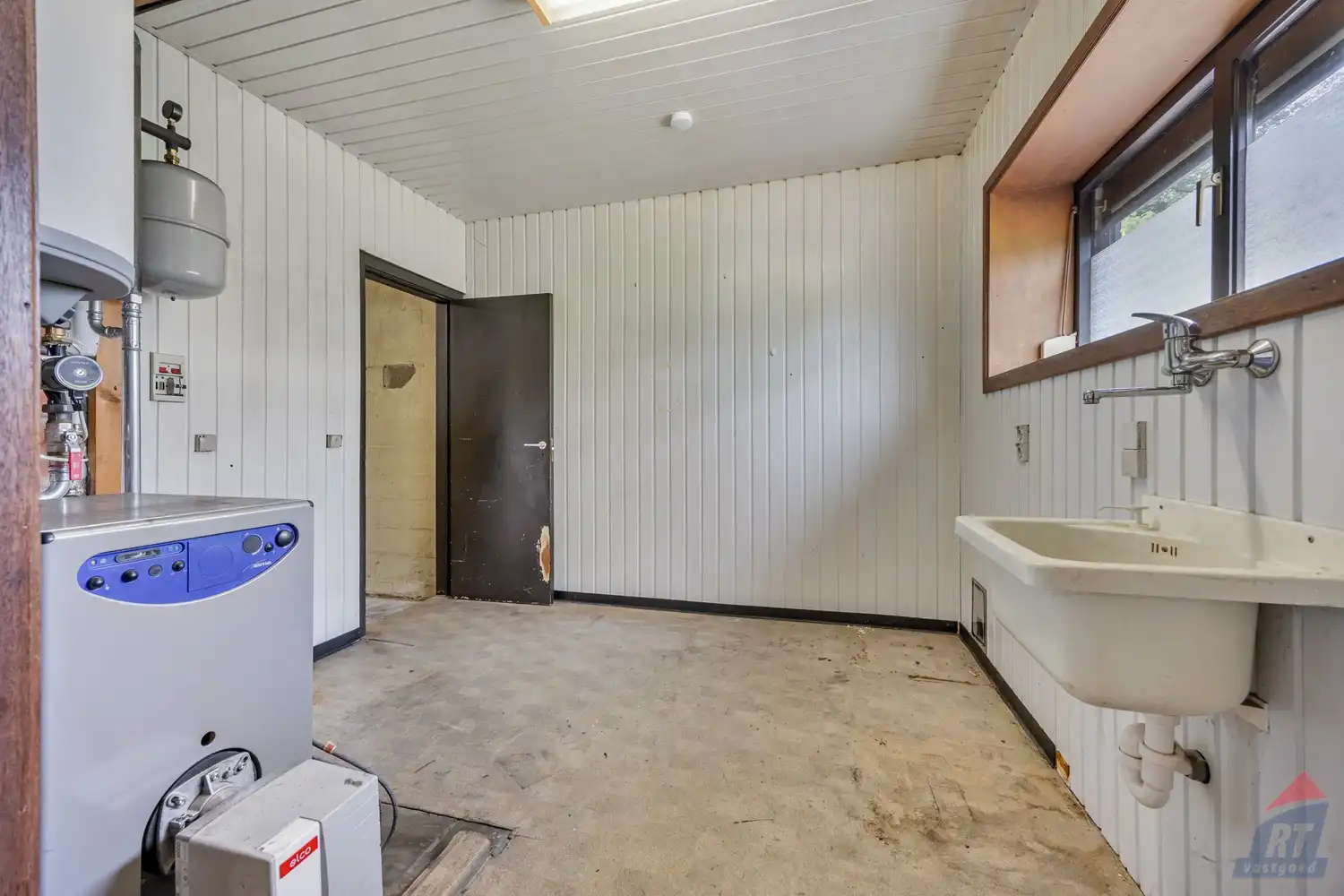 Rustig gelegen, op te frissen woning in Alken foto 8