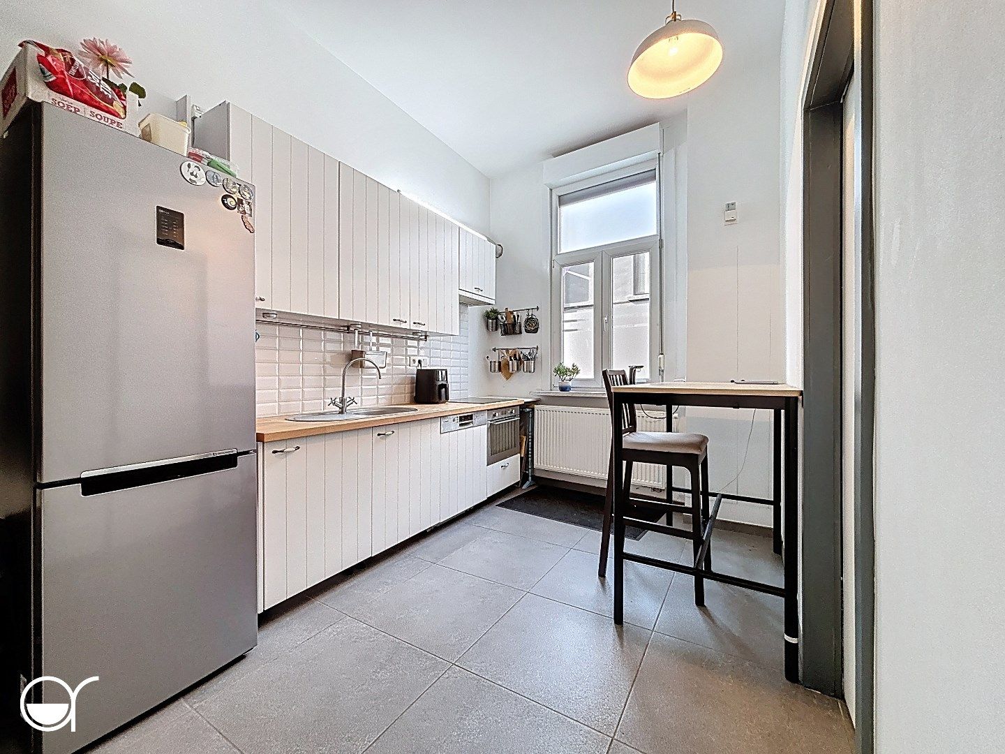 Rijwoning met terras en 3 slaapkamers foto 4